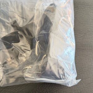 Black and White Item in Packaging